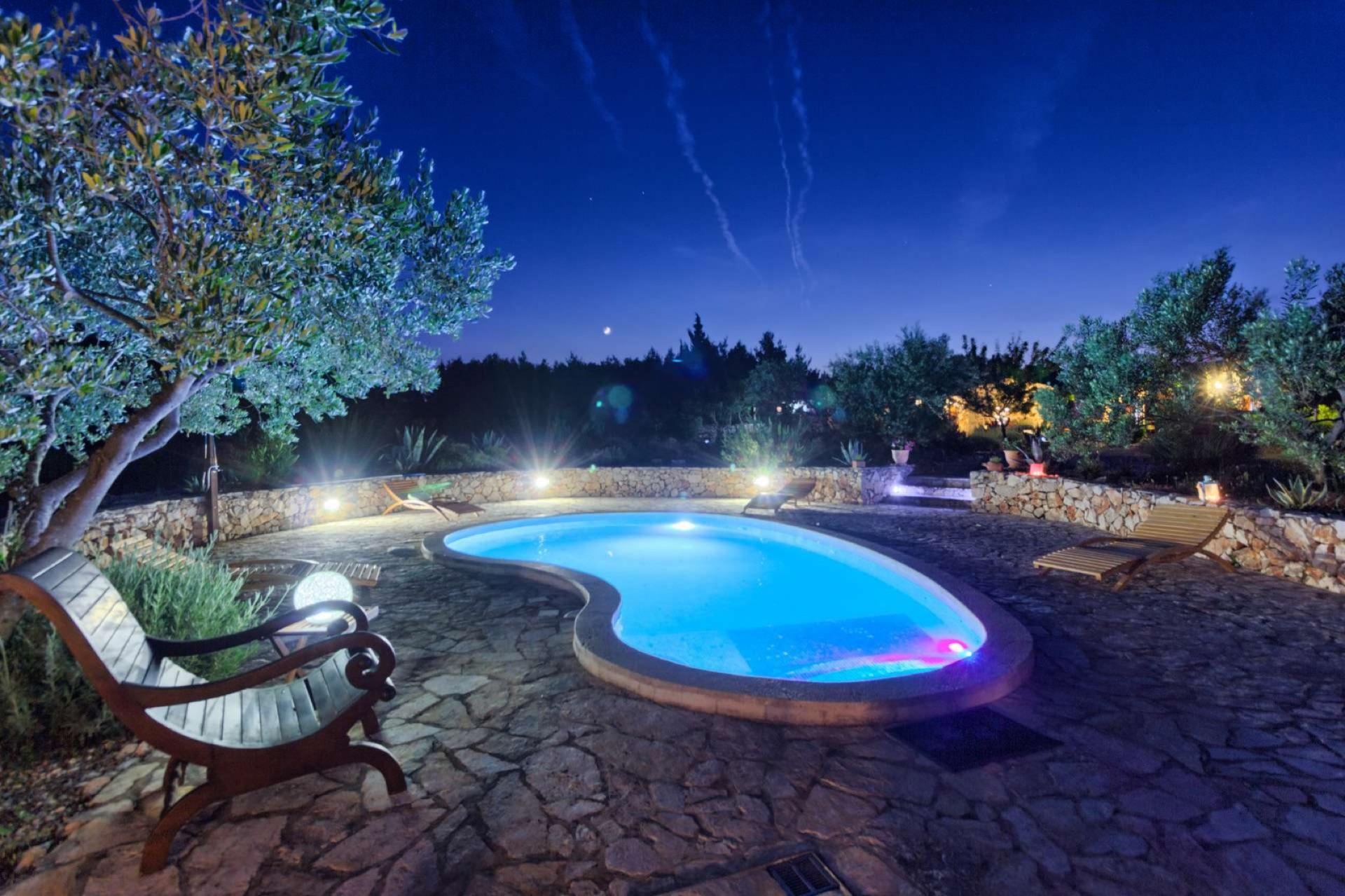 Private pool at night